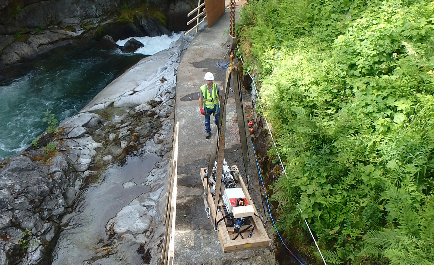 sewervue surveyor being lowered to access point